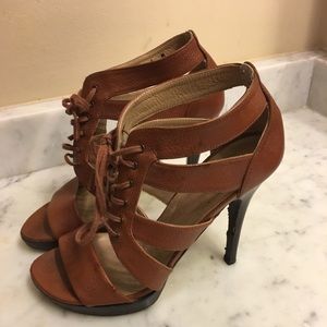 Stuart Weitzman lace up heels.